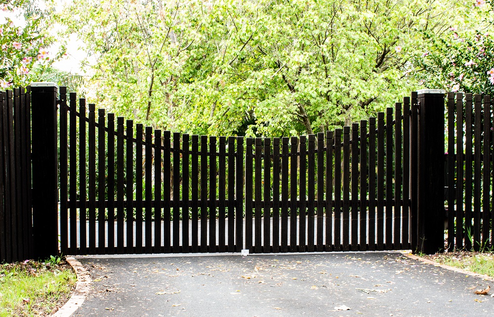 Dark,Wooden,Driveway,Property,Entrance,Gates,Set,In,Timber,Picket